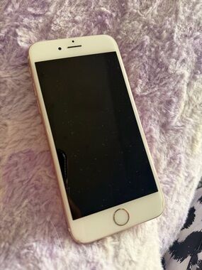 Apple iPhone in Rose Gold and White - Compact Smartphone